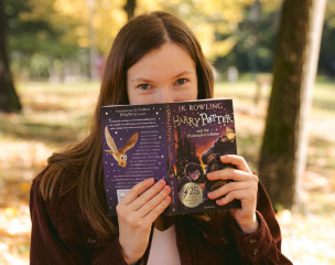 Photo of Hanna Stelmakh with a book